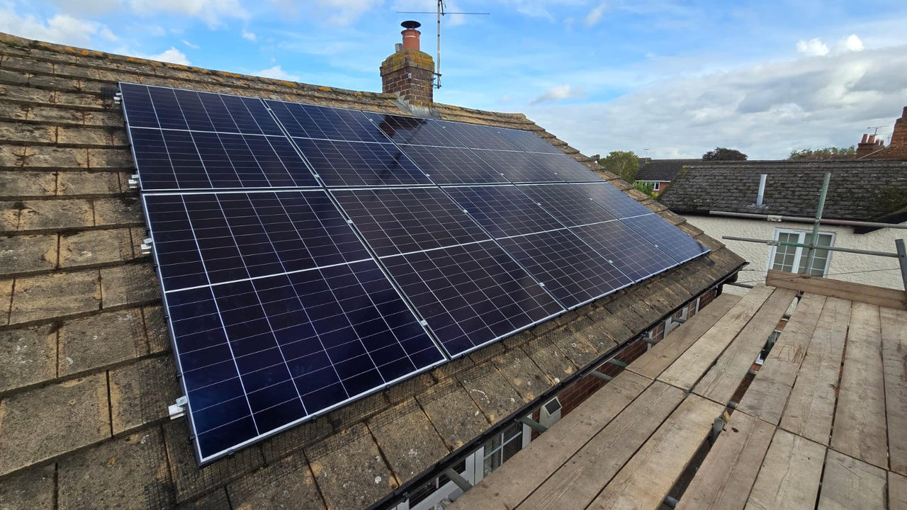 Solar panels installed on a rooftop in HP20 1JD