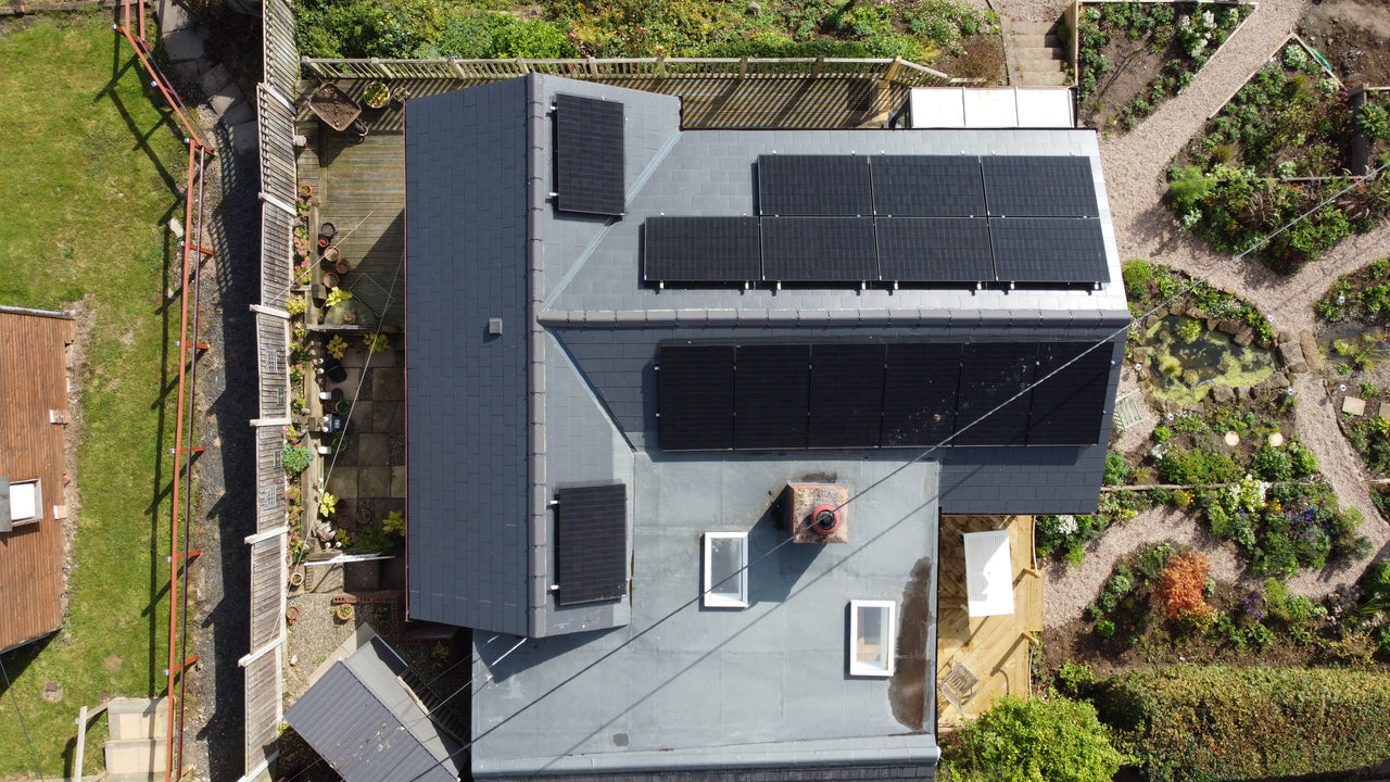 Aerial view of rooftop solar panels installation