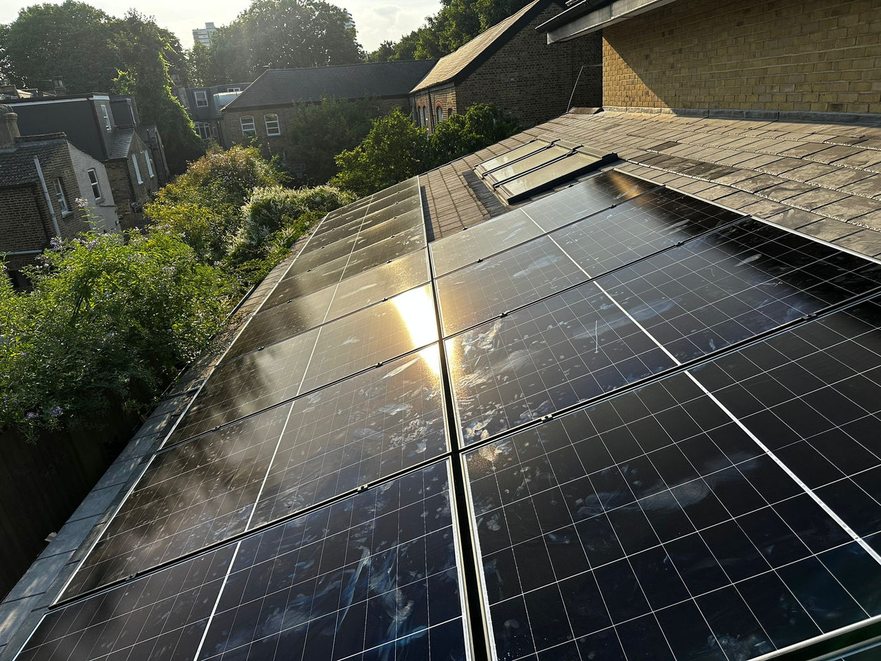 Rooftop with installed solar panels in SW11 2BQ