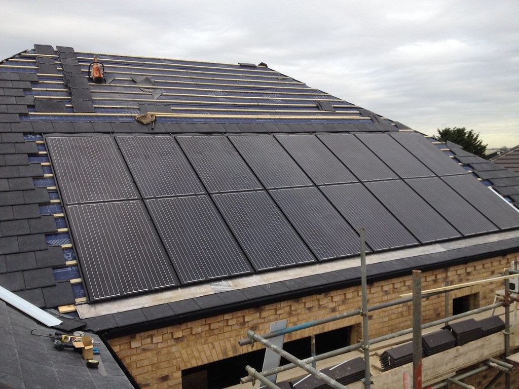 Large GSE in-roof solar panel array on building roof